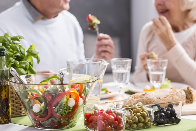 Senior couple eats healthy real food 