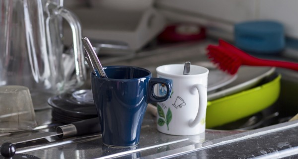 Cluttered kitchen of a senior citizen that is usually tidy.