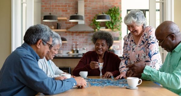 Group of friends doing a puzzle