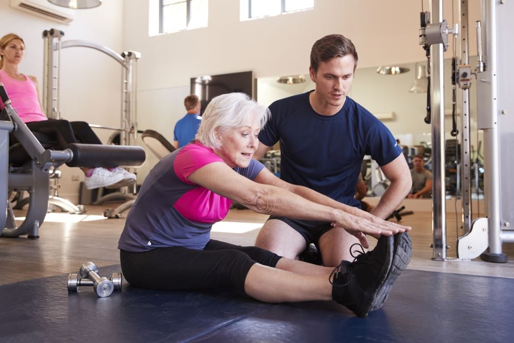 woman with personal trainer