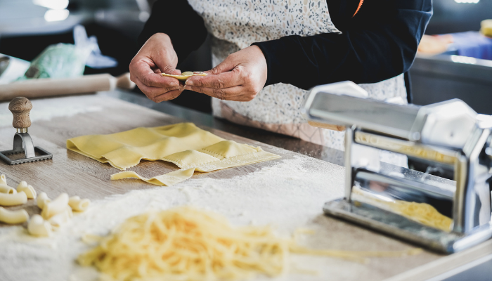 person making home made ravioli