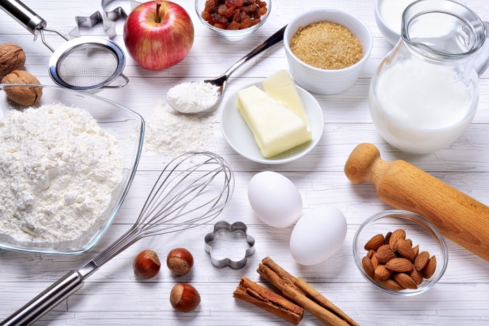 Healthy baking ingredients on white table