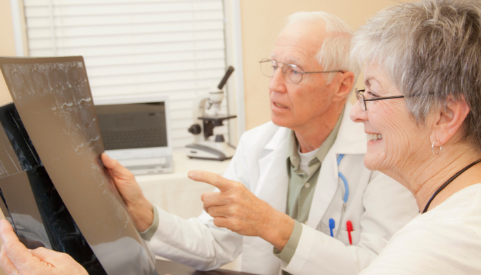 Mature adult looking after their health by speaking with a physician.