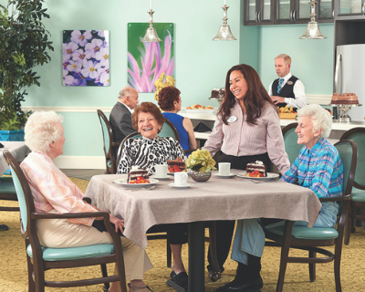 Reflections residents enjoy chef-prepared meals in a country club dining room setting at The Bristal