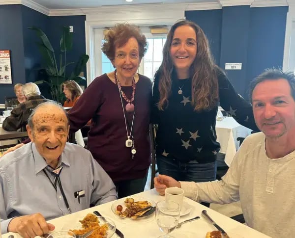 Residents and family eating a meal together at The Bristal