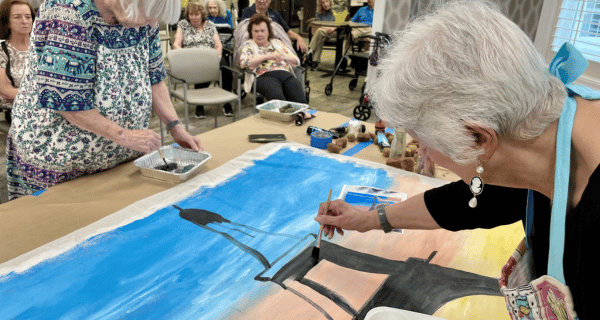 East Northport resident paints the Eiffel Tower as part of French cultural immersion event