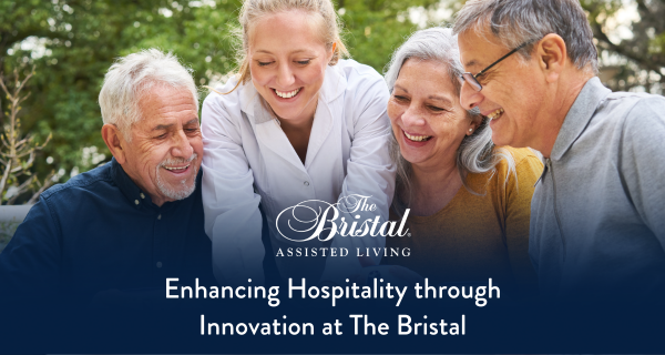 Residents of The Bristal Assisted Living and team members smile while engaging in programming