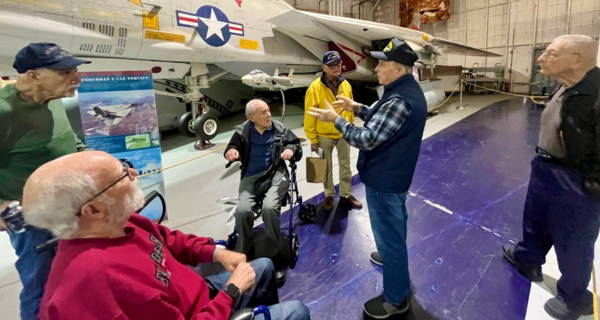 Resident Veterans of The Bristal at East Northport gather at The Cradle of Aviation museum.