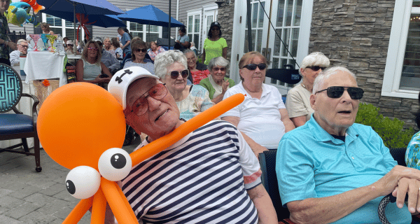 Residents enjoyed the live entertainment while they lounged poolside with family and friends.