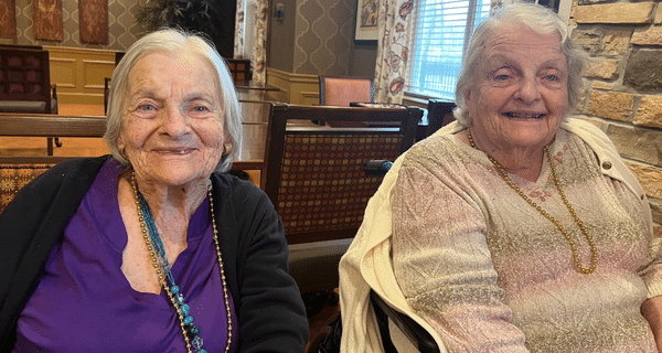 senior women smiling for camera