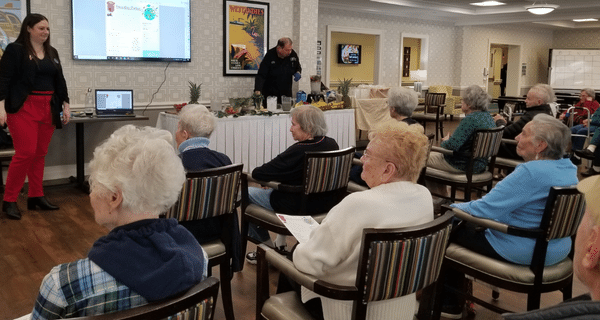 dietician giving lecture to group of seniors