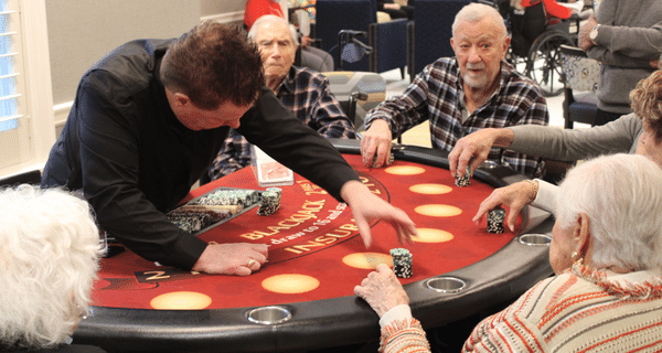 group of seniors playing blackjack