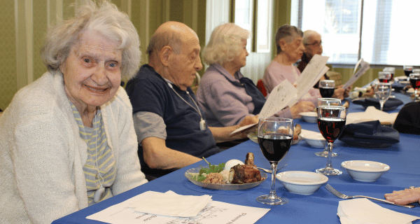 group of seniors participating in passover seder