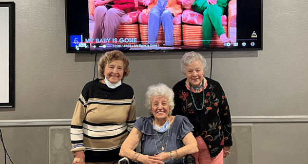 senior women smiling at camera