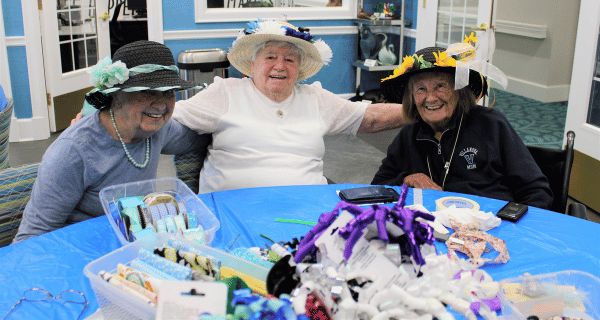 senior women making derby hats