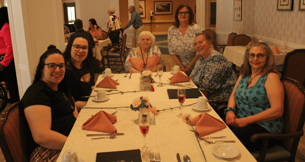 senior woman with family at brunch