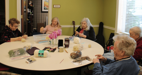 senior women knitting together