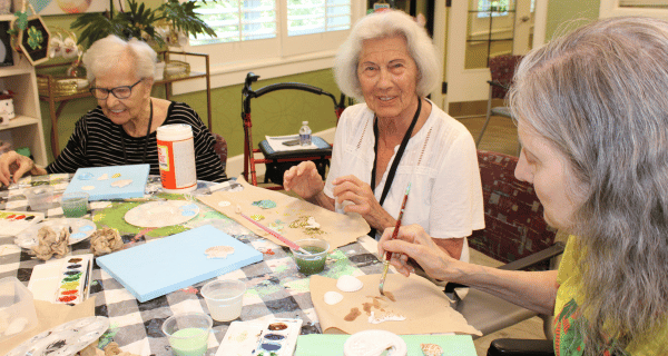 senior women working on summer arts project