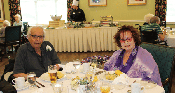 senior couple at dinner table
