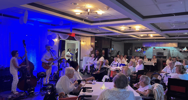 live entertainment performing for group of seniors