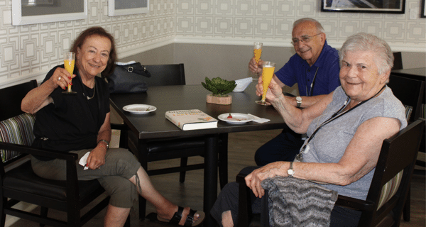 group of seniors enjoying mimosas