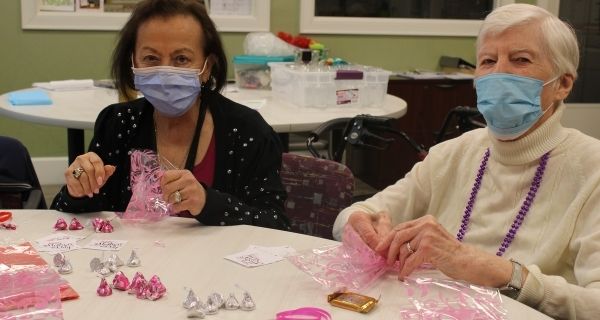 Residents at The Bristal at Wayne prepare surprise treats for staff for Mother's Day