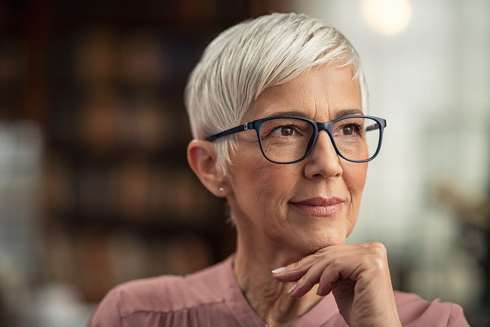 Confident senior envisioning life in a New Jersey community during her senior living decision journey