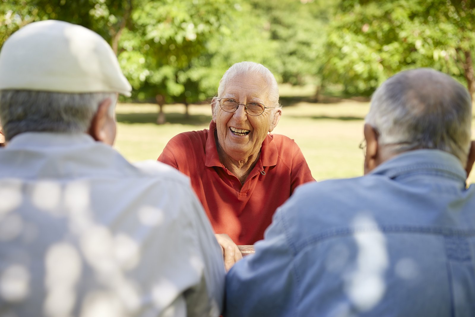 Three older men combating senior loneliness together