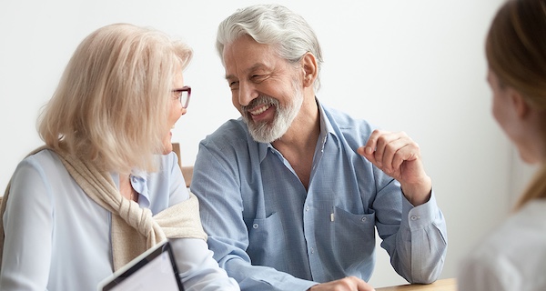 Older couple reviewing senior assisted living community in NYC