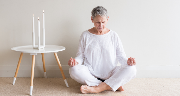 senior woman in a meditative pose