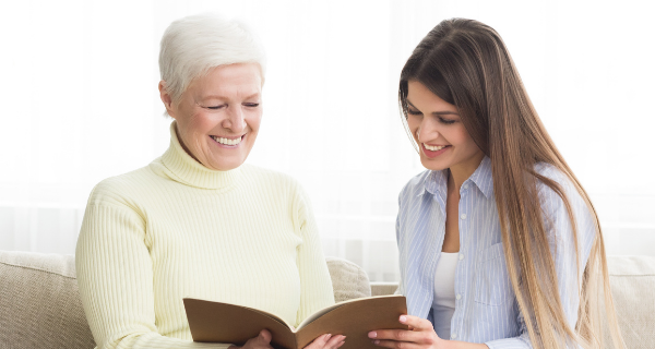 Senior mother and daughter planning a move to assisted living.