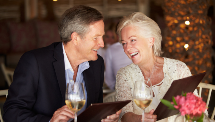 Mature couple enjoys upscale dining 